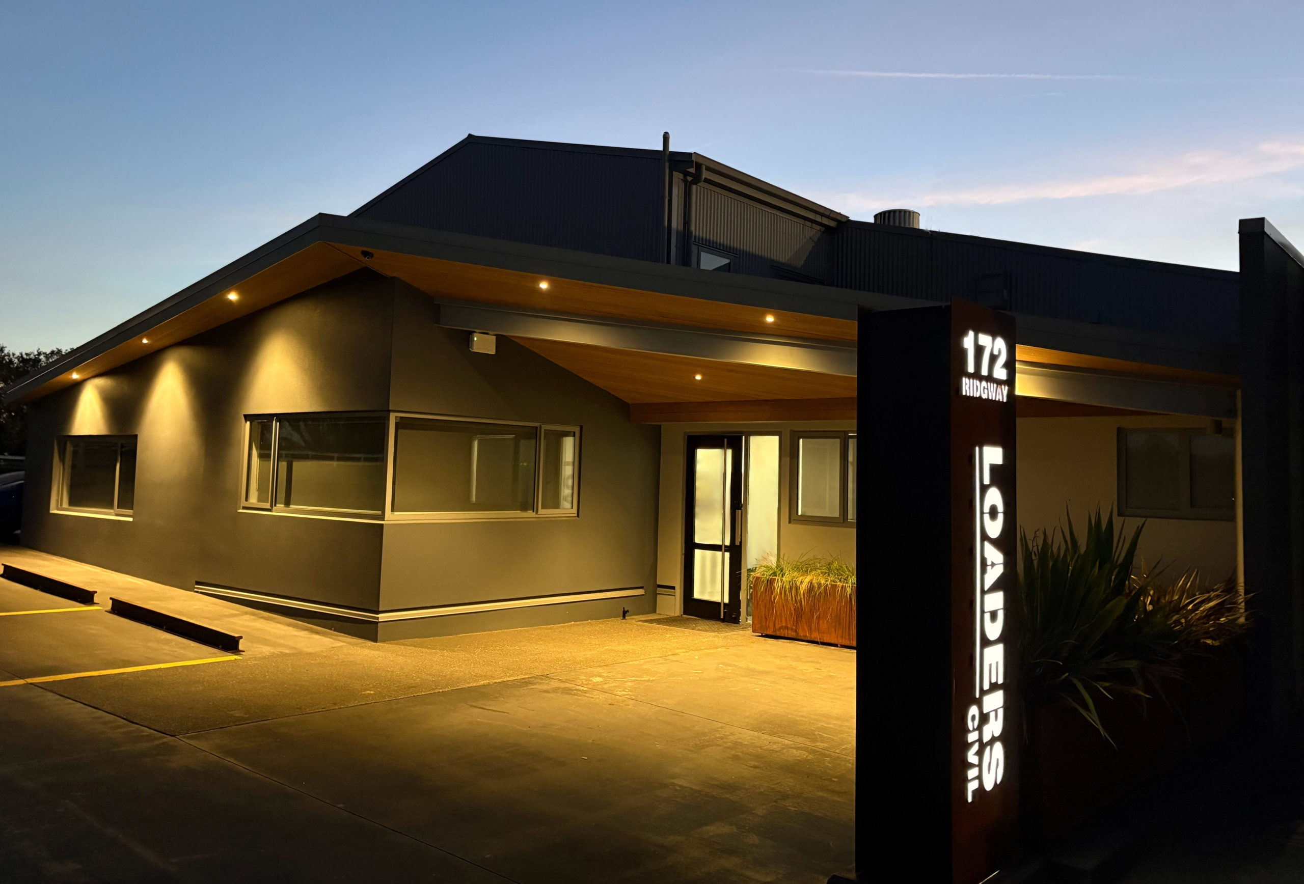 Loaders Civil Construction head office building at 172 Ridgway Street, Whanganui at dusk