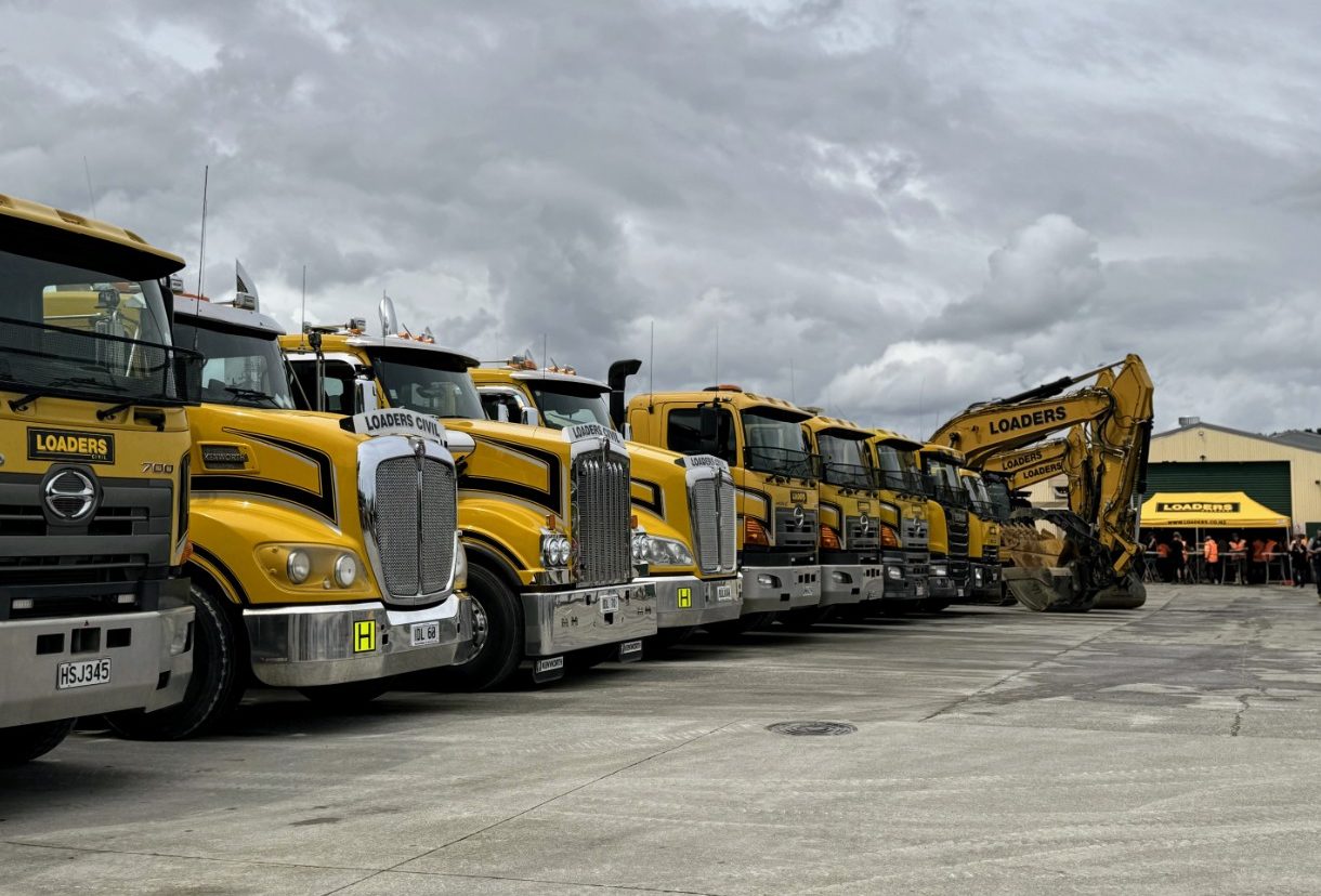 Loaders fleet of civil construction machinery and trucks